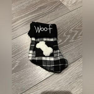 Small Doggie “Woof” Paw Christmas stocking in Black & White checkered pattern.